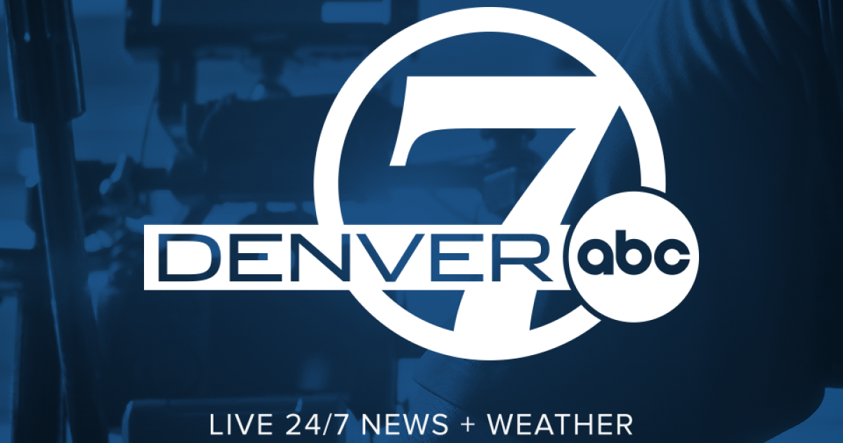 The image features the logo of Denver7 ABC, a news station, with the text "LIVE 24/7 NEWS + WEATHER" at the bottom. The background shows a blurred image of a camera setup, giving the visual a professional broadcast feel.