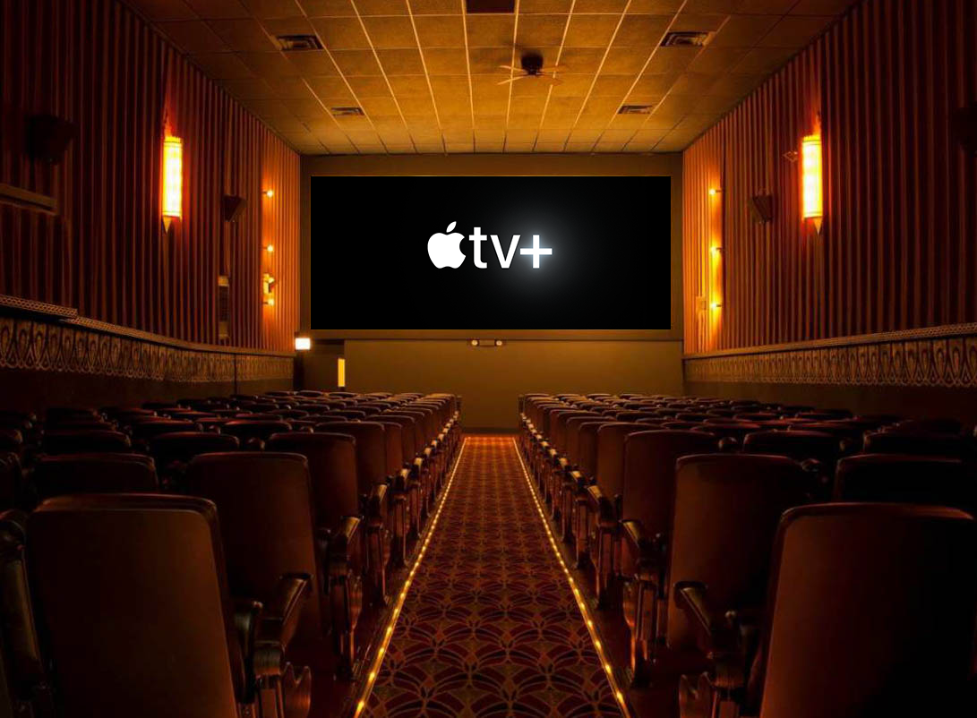 The image shows the interior of a vintage-style movie theater with rows of plush seats facing a large screen. The screen displays the Apple TV+ logo, which consists of the Apple logo followed by the text "tv+" in a sleek, modern font against a black background. The theater is dimly lit with warm lighting along the walls and aisle, creating a cozy ambiance.